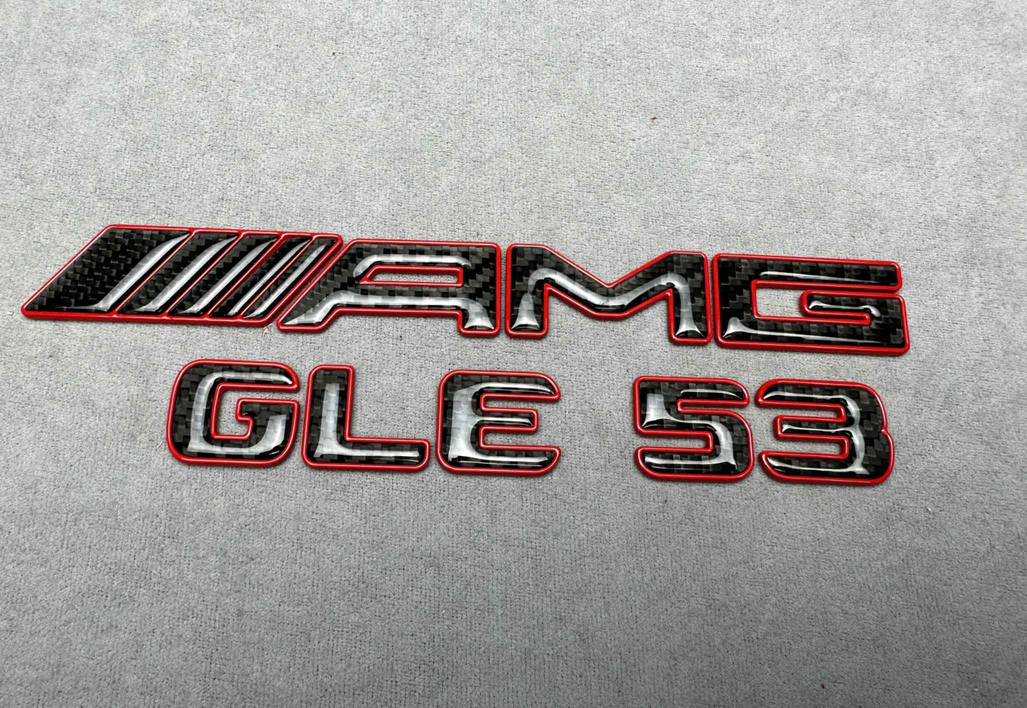 AMG GLE 53 carbon fiber emblem with red trim for Mercedes Benz GLE Class