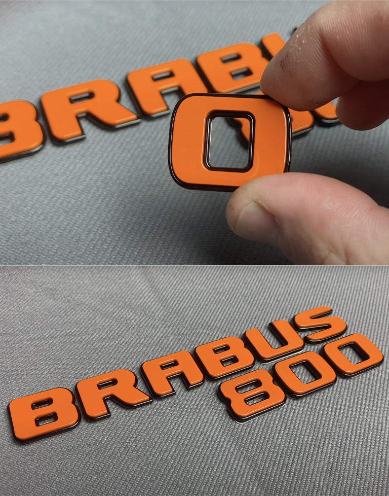 Orange metallic Brabus 800 logo for Mercedes Benz G Class trunk
