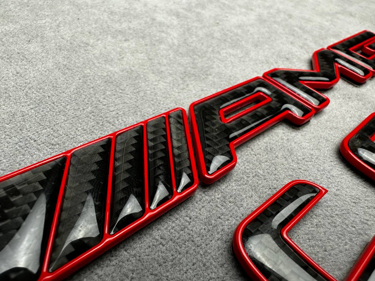 Mercedes AMG C 63 S carbon badge with red trim