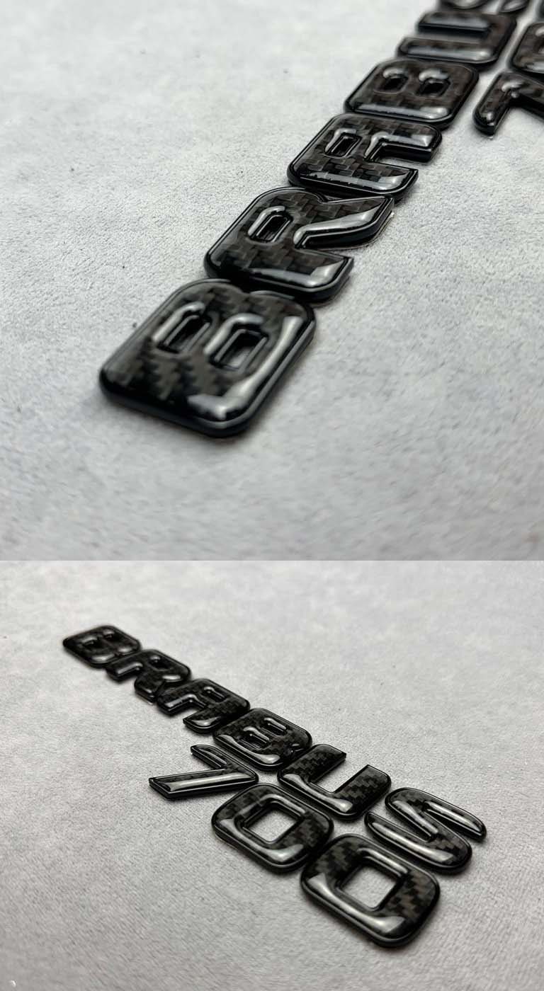 Tail Carbon Brabus 700 badges with black trim for G-Class