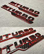 Emblem V8 biturbo 4 MATIC+ 2026 style red and carbon Badge