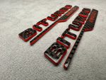 Emblem V8 biturbo 4 MATIC+ 2026 style red and carbon Badge - Image 2