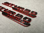Emblem V8 biturbo 4 MATIC+ 2026 style red and carbon Badge - Image 3