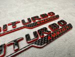 Emblem V8 biturbo 4 MATIC+ 2026 style red and carbon Badge - Image 4
